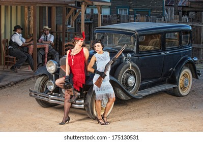 Group Of 1920s Gangsters Near Old Car With Guns