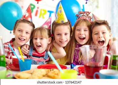 Group of adorable kids having birthday party