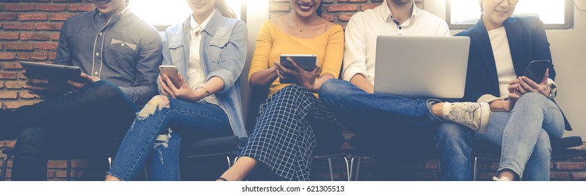 Group Adult Business Friends Sitting Chair Using Modern Gadgets.Business Startup Friendship Teamwork Concept.Creative People Working Together Sale Project.Coworking Wide And Brainstorm