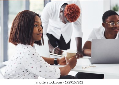 Group Of African American Business People Working In Office Together.