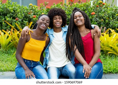 Group Of African American Friends Outdoor In Summer 