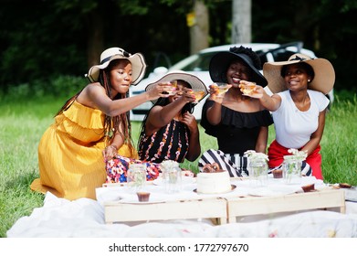 Group Of African American Girls Celebrating Birthday Party And Clinking Glasses Outdoor With Decor.