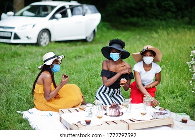 Group Of African American Girls With Facial Masks Celebrating Birthday Party Outdoor With Decor During Coronavirus Pandemia.