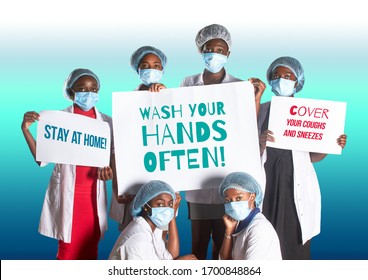 Group Of African Women Nurses Activists In Face Mask With Hand Sign Placard With Caption Wash Your Hands Often. Group Of Medics With Message To Public, Awareness Campaign For Covid-19 Illness.