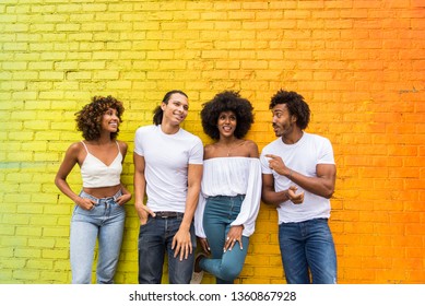 Group of afroamerican friends bonding in Manhattan, New York - Young adults having fun outdoors, concepts about lifestyle and young adult generation - Shutterstock ID 1360867928