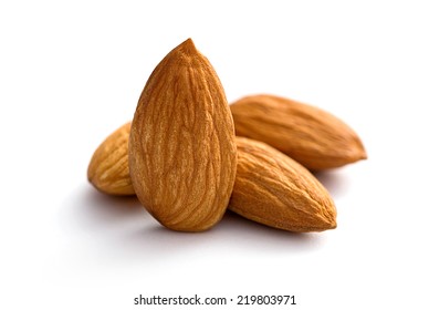 group of almonds isolated on white