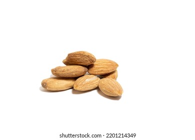 Group Almonds Isolated On White Background. Pile Of Roasted Almonds. Healthy Food Idea Concept. Copy Space, Space For Text. Empty Area. No People, Nobody.