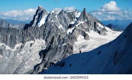 Group Of Alpinists Climbing The Montblanc Snowy Mountain