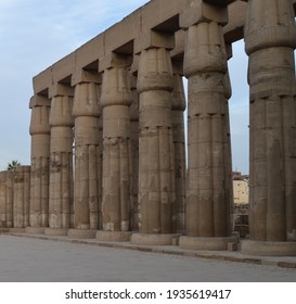 A Group Of An Ancient Egyptian  Pharaonic Pillars Made Of Stone From The Court Of King Amenhotep The Third, The Temple Of Luxor, The Luxor Governorate, Egypt