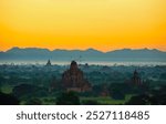 group of ancient pagodas in Bagan at the sun set, myanmar