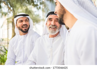 Group Of Arabian Businessmen With Kandura Meeting Outdoors In UAE - Middle-eastern Men In Dubai