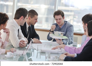 Group Of Architect Business Team People On Meeting Looking Model And Desing Of New Real Estate House