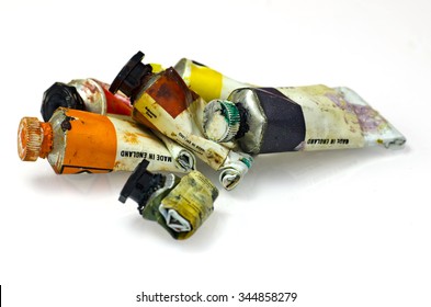 Group Of Artists Paint Tubes; Used Tubes Of Oil Paints, Isolated On White Ground; Differential Focus 