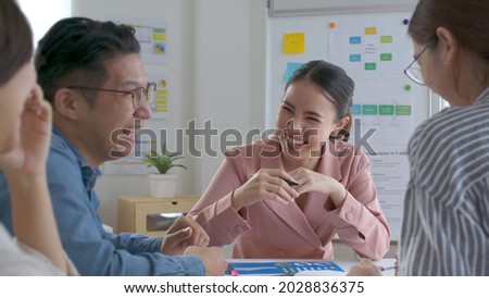 Group of asia people smile relax study enjoy learn workshop training class in good break time fun talk work at modern cowork office. MBA startup team woman engage job unity of workforce design career.