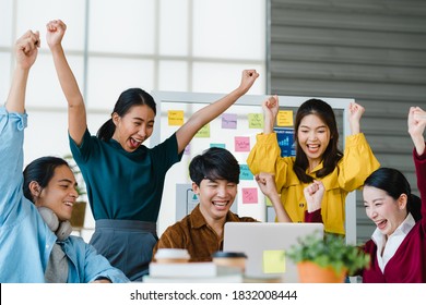 Group Of Asia Young Creative People In Smart Casual Wear Discussing Business Celebrate Giving Five After Dealing Feeling Happy And Signing Contract Or Agreement In Office. Coworker Teamwork Concept.