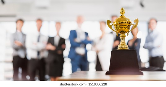 Group of Asian Business people celebrate for trophy, reward, winner, champion and teamwork successful concept - Powered by Shutterstock