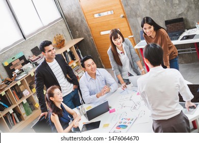 Group Of Asian Business People And Creative Designer Meeting In Office, Top View