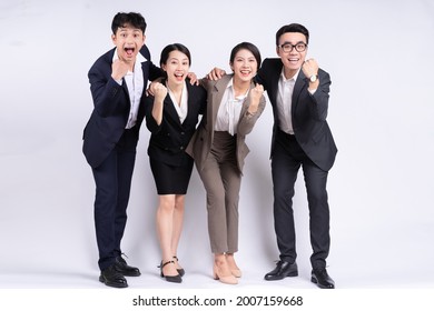 Group Of Asian Business People Posing On A White Background
