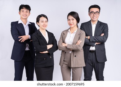 Group Of Asian Business People Posing On A White Background
