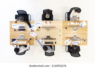 Group Of Asian Business People Working Together In Modern Office,m Taken From Top View High Angle.