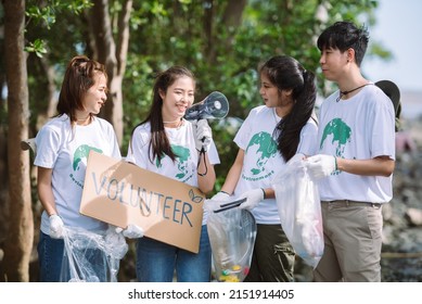 Group of Asian diverse people volunteer holding a speech sign for World Environment Day campaign,Earth Day about pollution,ecosystem,energy and garbage. - Shutterstock ID 2151914405