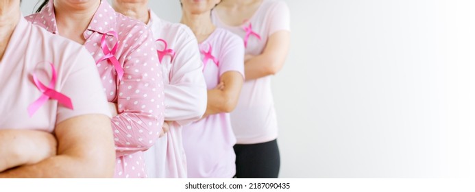 Group Of Asian Multi-age Women Power In Pink Shirt And Pink Ribbon For October Breast Cancer Awareness Month With Banner Copy Space