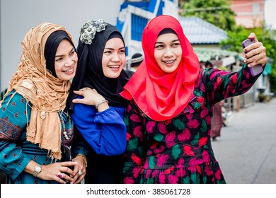 A Group Of Asian Muslim Girl Taking Selfie