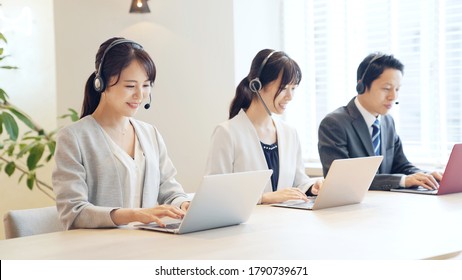 Group Of Asian Operator. Call Center. Customer Support.