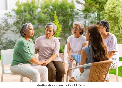 Group of Asian senior mature woman talking discussion about mental health life problem thoughtful with professional psychiatrist in the garden. Elderly people mental health care and therapy concept. - Powered by Shutterstock