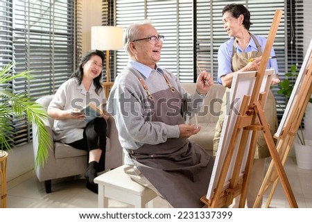 Group of Asian senior people are enjoy  painting at elderly healthcare center, elder group therapy concept
