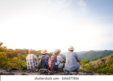 A Group Of Asian Seniors Hiking And Standing On High Mountains Enjoying Nature. Senior Community Concepts