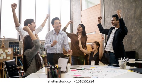 Group of Asian team creative business people Happy to be successful partnership teamwork concept - Powered by Shutterstock