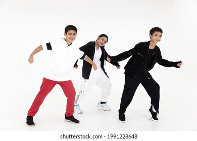 Group of Asian teen teenager dancing hiphop class. Kids enjoy dance with happy smile funny isolated on white background.