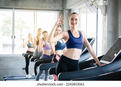 Group Asian woman doing cardio exercise standing on treadmill in gym. exercise every day will make a strong muscular body and respiratory system and good blood vessels. burn fat and cholesterol