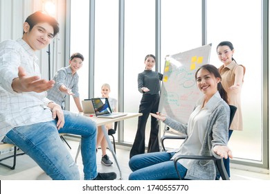 Group Of Asian Young Creative Happy Enjoy Laugh Smile And Great Success Emotion Teamwork People Business Startup Entrepreneur Casual Brainstorm Business Meeting Office Background