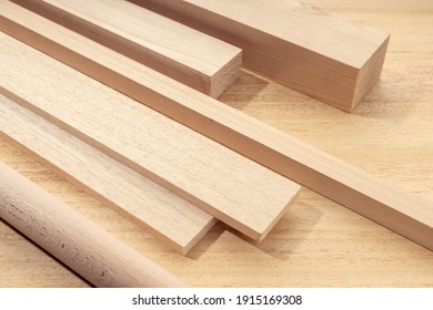 Group of assorted wood material like planks, squares, sheets. Timber for carpentry