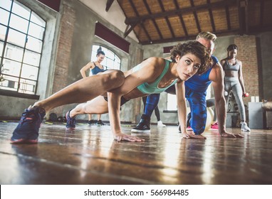 Group Of Athlete Training With Functional Gymnastic