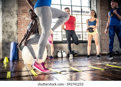 Group Of Athlete Training With Functional Gymnastic