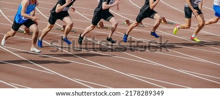 group athletes runners start running in sprint