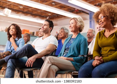 Group Attending Neighborhood Meeting In Community Center