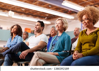 Group Attending Neighborhood Meeting In Community Center