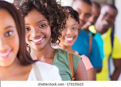 group of attractive african american college students on campus