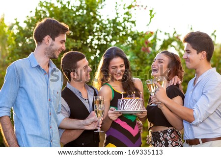 Man with piece of cake in a summer barbecue