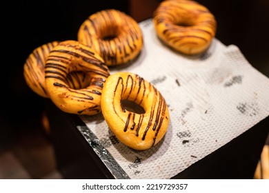 Group Of Baked Doughnut With Chocolate Topping. Sweet Food Object Photo, Selective Focus.