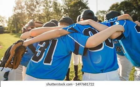 Group of baseball players standing together on the playground - Powered by Shutterstock