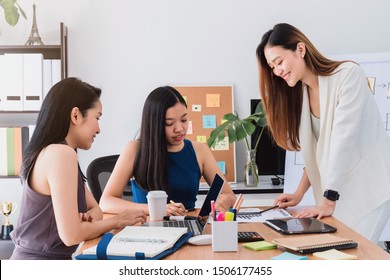 Group Of Beautiful Asian Women Meeting In Office To Discussion Or Brainstorm Business Startup Project.Concept Of Teamwork Of Empower Woman.