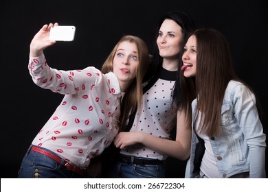 Group Of Beautiful Girlfriends Pulling Funny Faces, Taking Selfie, Self-portrait With Smartphone, Best Friends Happy Smiling Together, Having Fun, Posing For Group Photo