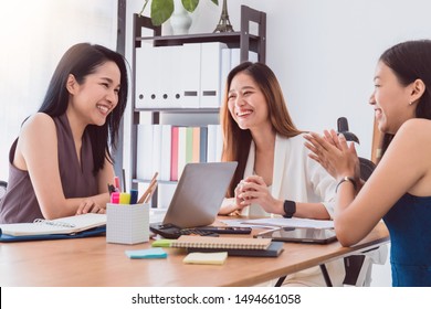 Group Of Beautiful  Happy Asian Women Meeting In Office Space To Discussion Or Brainstorm Business Startup Project.Concept Of Teamwork Of Empower Woman.