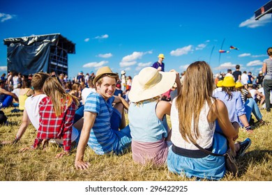 Group of beautiful teens at concert at summer festival - Shutterstock ID 296422925