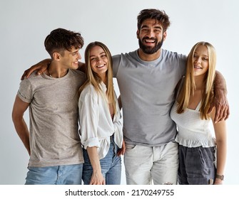 Group Of Best Friends Hugging And Looking At The Camera